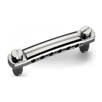SCHALLER STOP TAILPIECE NI (арт. 12050100) - фиксируемый струнодержатель для бриджей STM и GTM серий, регулируется по высоте, установочные винты и гайки в комплекте, отделка: никель, полированный, размеры 101x17x12, размеры отверстий 11 мм. (Старый артику