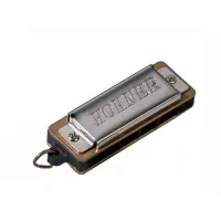 M12001 Mini Harp Стеклянная банка с мини губными гармошками завернутыми как конфеты. Hohner