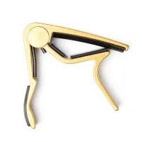 Dunlop 83cg trigger curved gold  каподастр "прищепка" для гитары с закругленным грифом, золотой